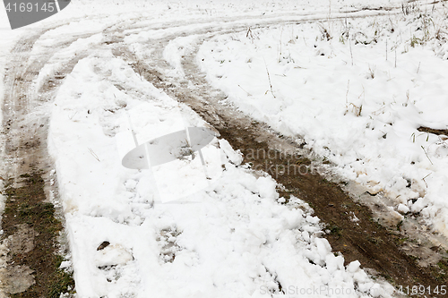Image of traces of the car in the snow