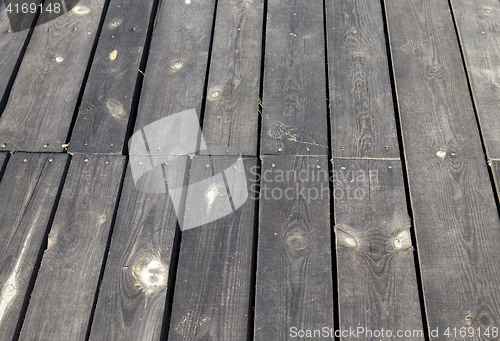 Image of black wooden surface