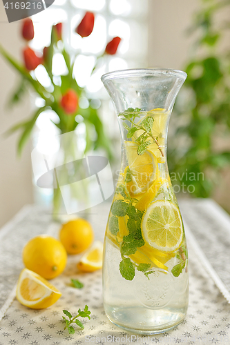 Image of Fresh limes and lemonade