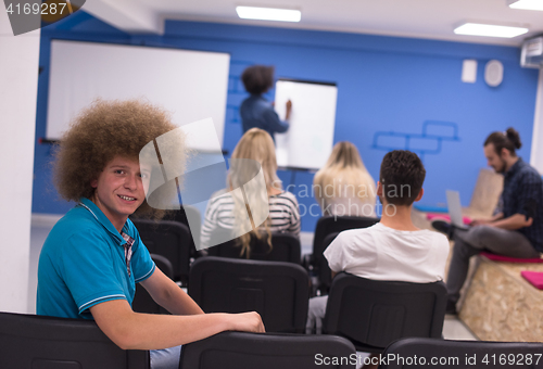 Image of Portrait of young informal businessman