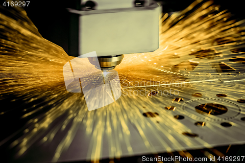 Image of CNC Laser cutting of metal, modern industrial technology. .