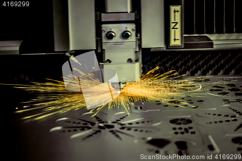 Image of CNC Laser cutting of metal, modern industrial technology. .