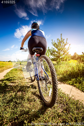 Image of Women on bike