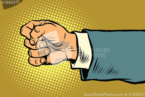 Image of Hand of a businessman beats fist