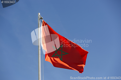 Image of National flag of Morocco on a flagpole