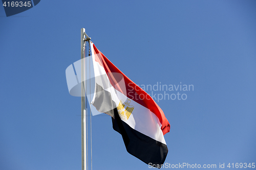 Image of National flag of Egypt on a flagpole