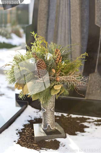 Image of Flower arrangement at a grave