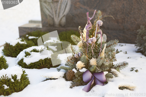 Image of Flower arrangement at a grave