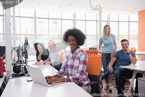 Image of African American informal business woman working in the office