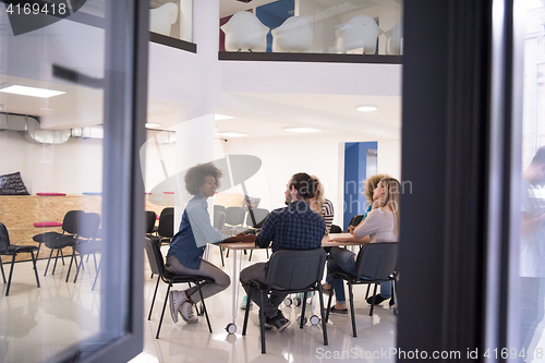 Image of Multiethnic startup business team on meeting