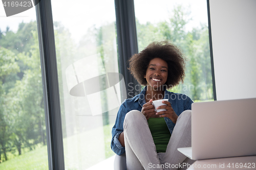 Image of African American woman in the living room