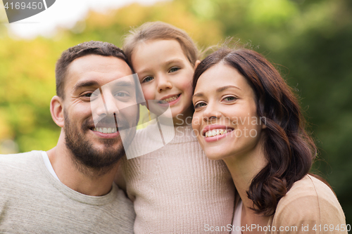 Image of happy family in summer park