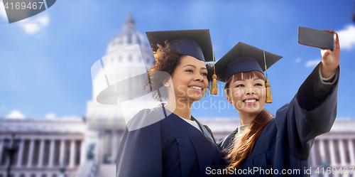 Image of students or bachelors taking selfie by smartphone