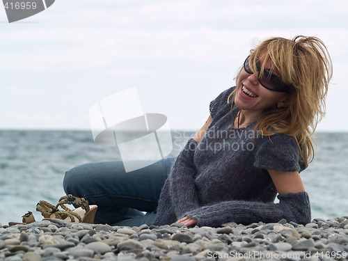 Image of Beautiful Young Lady Smiling on Beach