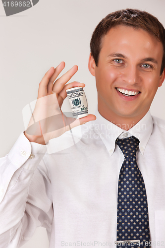 Image of Young Man With Dollars