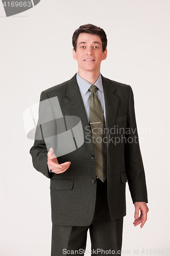 Image of Young Emotional Man In A Business Suit