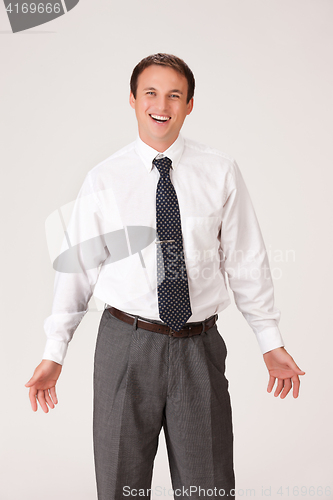 Image of Young Emotional Man In A Business Suit