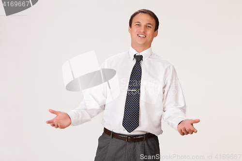 Image of Young Emotional Man In A Business Suit