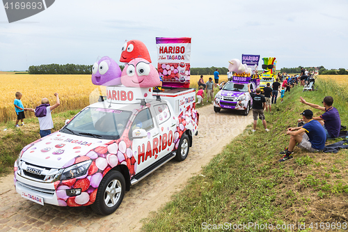 Image of Haribo Caravan on a Cobblestone Road- Tour de France 2015