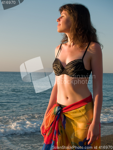 Image of Beautiful lady in Bikini on Beach Sunset