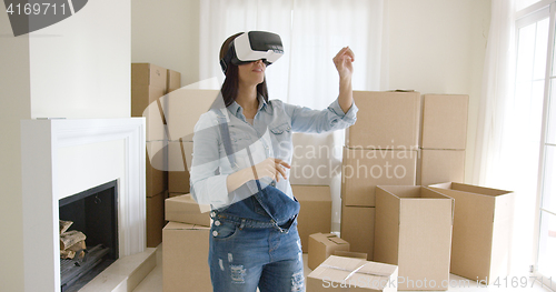 Image of Woman interacting with her virtual environment