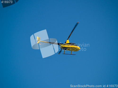 Image of Small private Helicopter in Sky