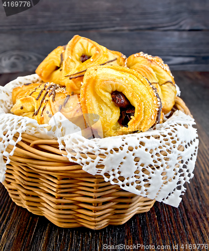 Image of Cookies with dates in basket on board