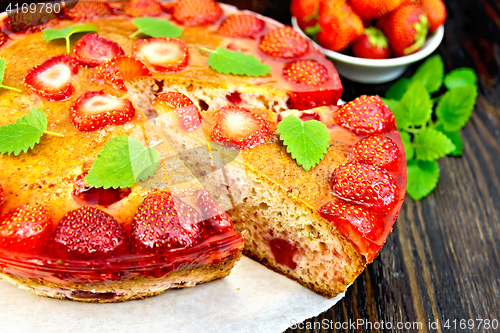 Image of Pie strawberry with jelly on dark board