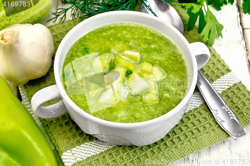 Image of Soup cucumber in white bowl on board