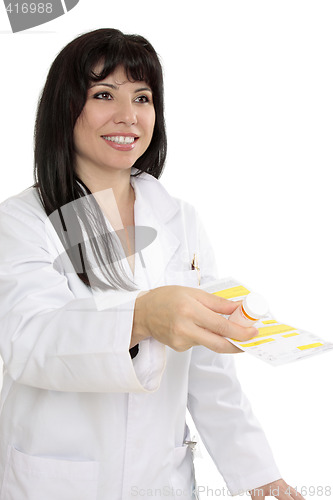 Image of Pharmacist with prescription and medicine