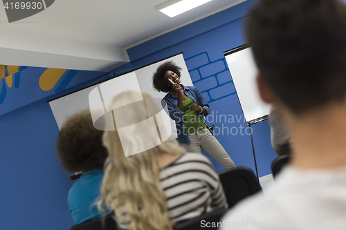 Image of Black woman Speaker Seminar Corporate Business Meeting Concept