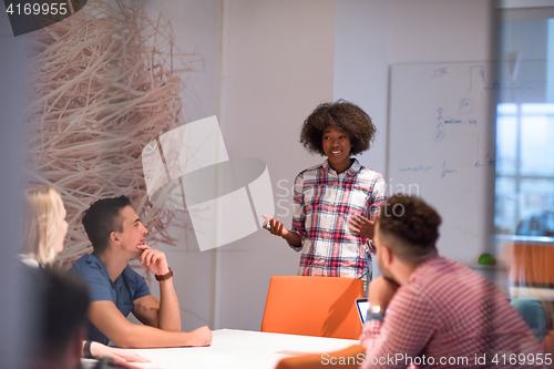 Image of Multiethnic startup business team on meeting