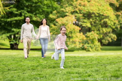 Image of happy family walking in summer park and having fun