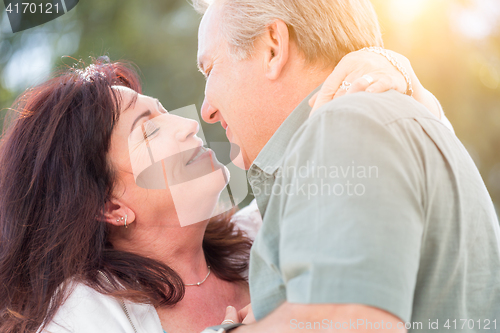 Image of Middle Aged Couple Enjoy A Romantic Slow Dance Outside