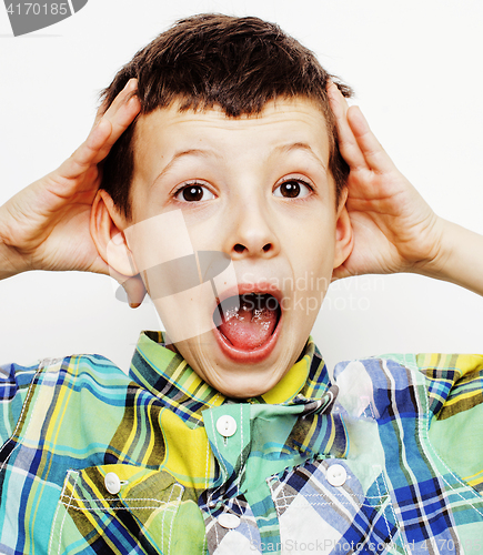 Image of young pretty little cute boy kid wondering, posing emotional face isolated on white background, gesture happy smiling close up, lifestyle people concept