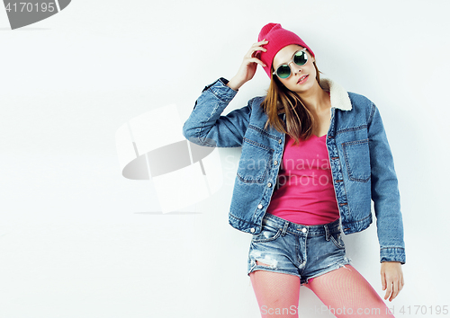 Image of young pretty teenage hipster girl posing emotional happy smiling on white background, lifestyle people concept close up