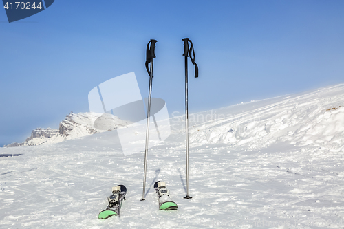 Image of Skis and Stick on the Snow