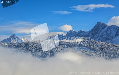 Image of Peaks Over the Clouds