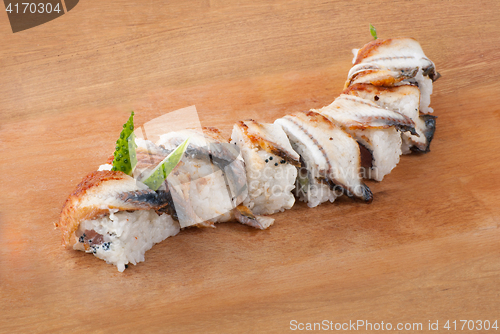 Image of Japanese sushi with eel on wooden plate