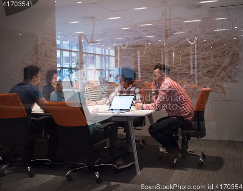 Image of Multiethnic startup business team on meeting