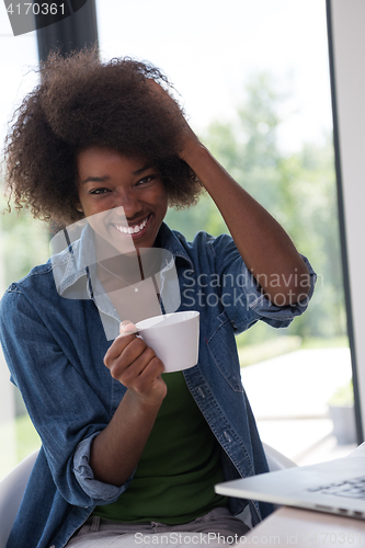 Image of African American woman in the living room