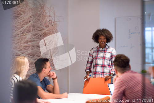 Image of Multiethnic startup business team on meeting