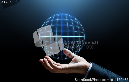 Image of close up of businessman hand with hologram