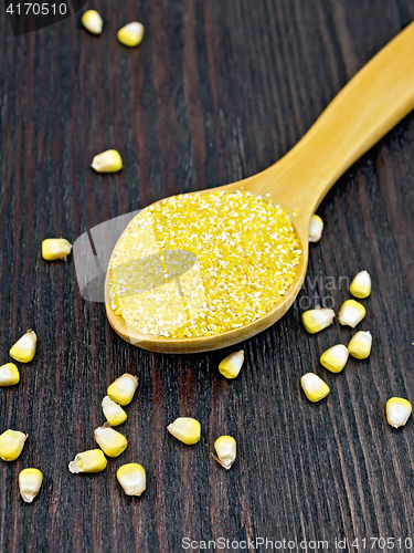 Image of Corn grits in spoon on board