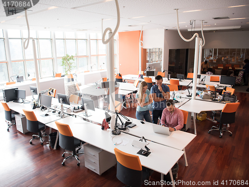 Image of Group of young people employee workers with computer