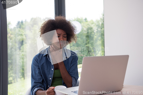 Image of African American woman in the living room