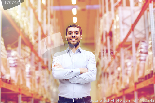 Image of happy man at warehouse