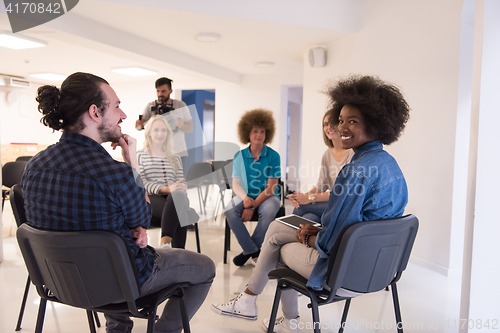 Image of Multiethnic startup business team on meeting