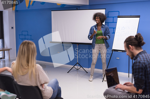 Image of Black woman Speaker Seminar Corporate Business Meeting Concept