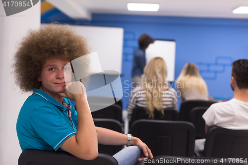 Image of Portrait of young informal businessman